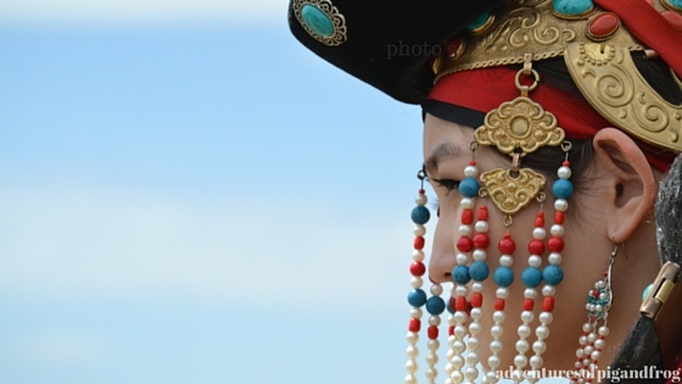 Mongolian Woman in Traditional Dress in the countryside