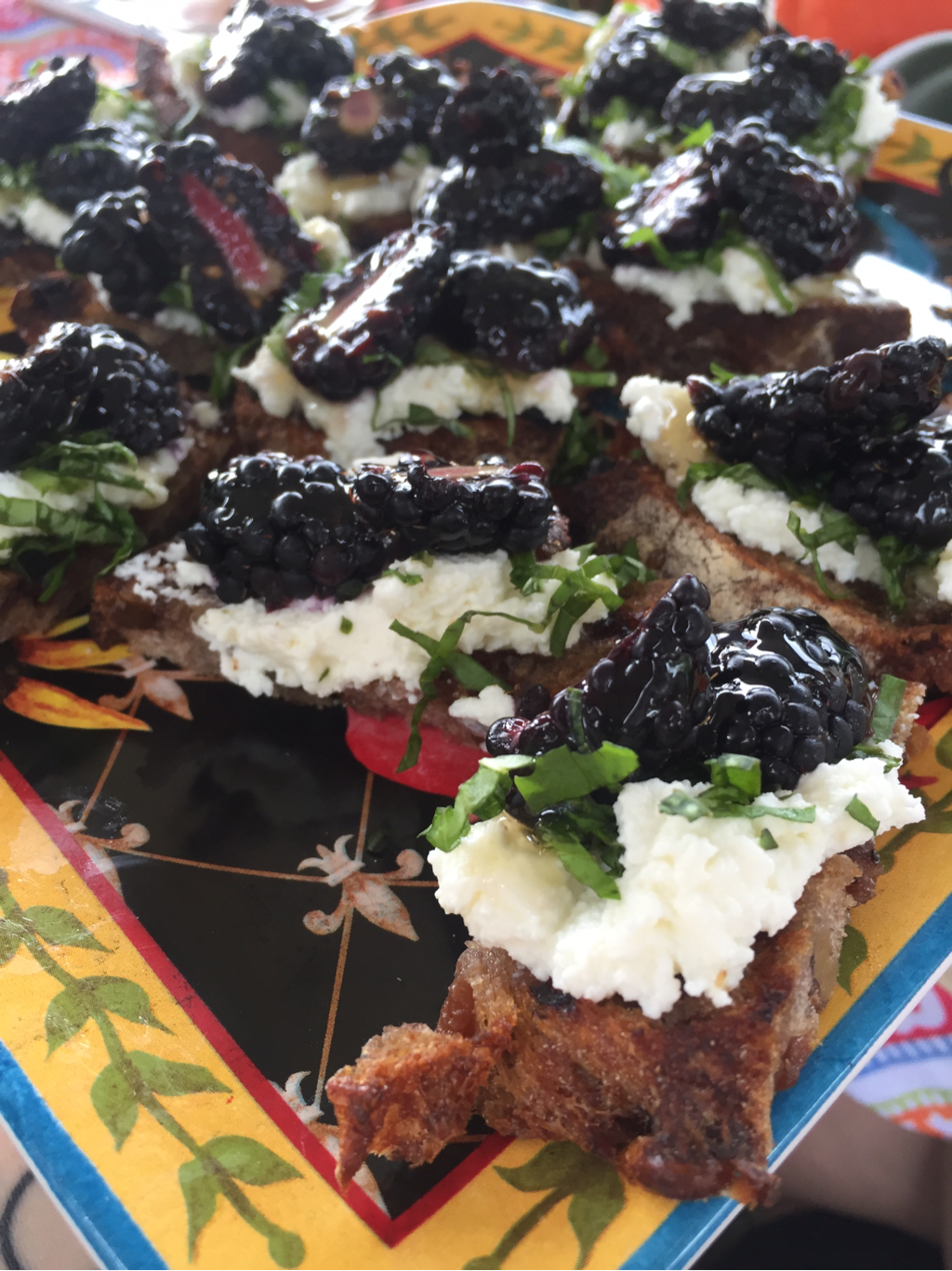 Walnut-Raisin Bread with Ricotta, Basil, Blackberries and Honey, all local finds